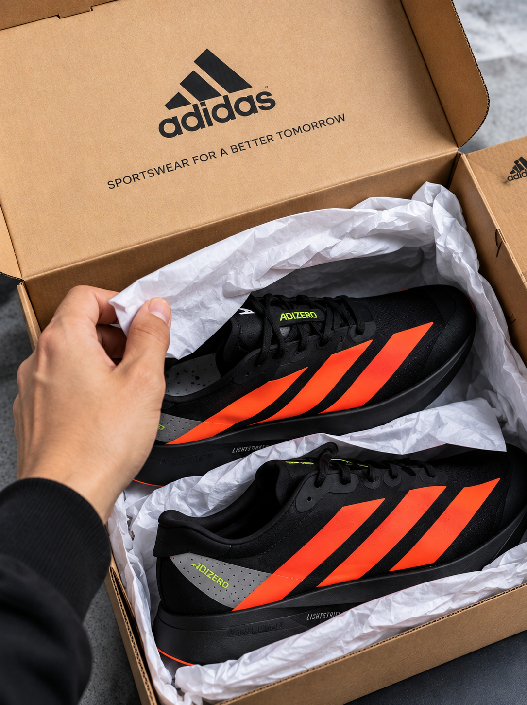 adidas Adizero Boston 12 – Ivory / Core Black / Solar Red